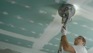 Man Polishing the Ceiling